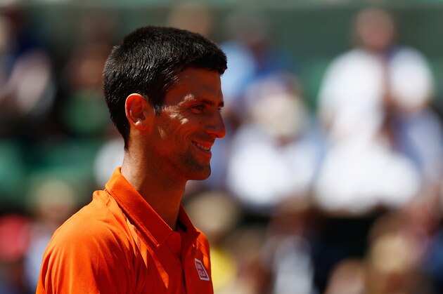 PARIS, FRANCE - JUNE 06: Novak Djokovic of Serbia smiles in his Men's Semi Final match against Andy Murray of Great Britain on day fourteen of the 2015 French Open at Roland Garros on June 6, 2015 in Paris, France. (Photo by Julian Finney/Getty Images) PARIS, FRANCE - JUNE 06: Novak Djokovic of Serbia smiles in his Men's Semi Final match against Andy Murray of Great Britain on day fourteen of the 2015 French Open at Roland Garros on June 6, 2015 in Paris, France. (Photo by Julian Finney/Getty Images)