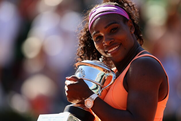 PARIS, FRANCE - JUNE 06:  Serena Williams of the United States poses with the Coupe Suzanne Lenglen trophy after winning the Women's Singles Final against Lucie Safarova of Czech Repbulic on day fourteen of the 2015 French Open at Roland Garros on June 6, 2015 in Paris, France.  (Photo by Clive Brunskill/Getty Images)