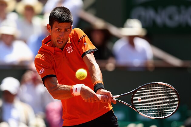 PARIS, FRANCE - JUNE 06:  Novak Djokovic of Serbia returns a shot in his Men's Semi Final match against Andy Murray of Great Britain on day fourteen of the 2015 French Open at Roland Garros on June 6, 2015 in Paris, France.  (Photo by Clive Brunskill/Getty Images)