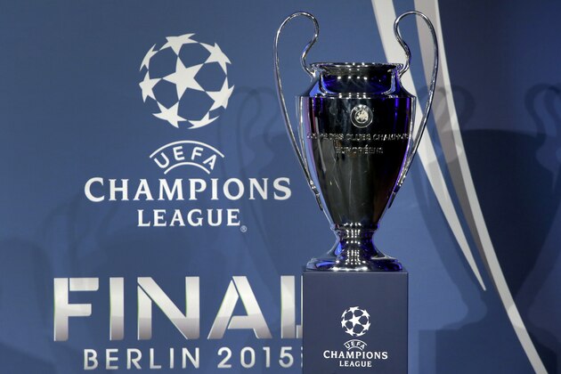 The Champions League trophy is displayed during a hand over reception in Berlin, Germany, Monday, April 27, 2015. The city of Berlin is host of the Champions League Final 2015. (AP Photo/Michael Sohn)
