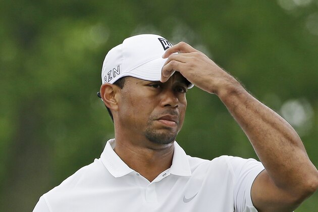 Tiger Woods waits to tee off on the 11th hole during the third round of the Memorial golf tournament Saturday, June 6, 2015, in Dublin, Ohio. (AP Photo/Darron Cummings)