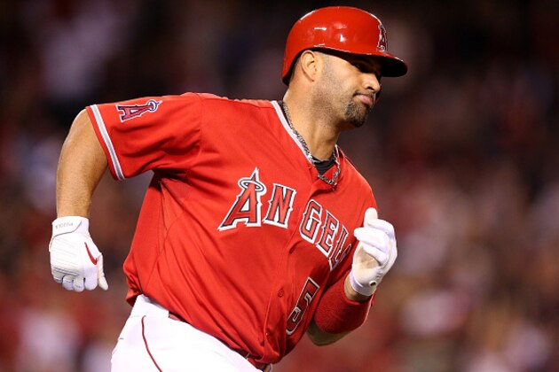 ANAHEIM, CA - JUNE 01: Albert Pujols #5 of the Los Angeles Angels of Anaheim rounds first base after hitting a solo home run in the fifth inning against the Tampa Bay Rays at Angel Stadium of Anaheim on June 1, 2015 in Anaheim, California. (Photo by Stephen Dunn/Getty Images) ANAHEIM, CA - JUNE 01: Albert Pujols #5 of the Los Angeles Angels of Anaheim rounds first base after hitting a solo home run in the fifth inning against the Tampa Bay Rays at Angel Stadium of Anaheim on June 1, 2015 in Anaheim, California. (Photo by Stephen Dunn/Getty Images)