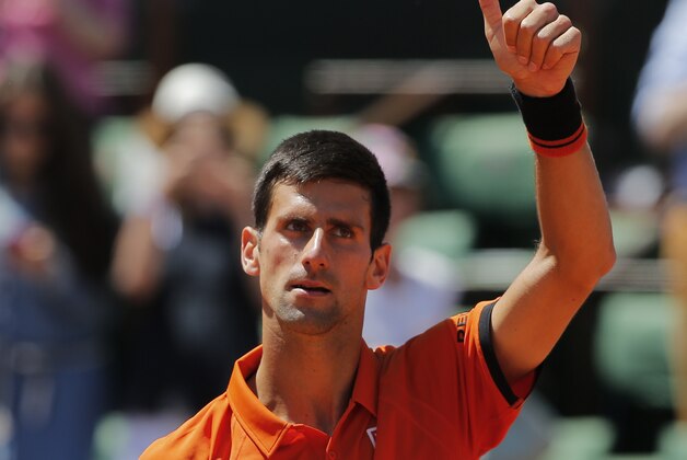 Serbia's Novak Djokovic thumbs up after defeating Britain's Andy Murray during their semifinal match of the French Open tennis tournament at the Roland Garros stadium, Saturday, June 6, 2015 in Paris. (AP Photo/Christophe Ena) Serbia's Novak Djokovic thumbs up after defeating Britain's Andy Murray during their semifinal match of the French Open tennis tournament at the Roland Garros stadium, Saturday, June 6, 2015 in Paris. (AP Photo/Christophe Ena)