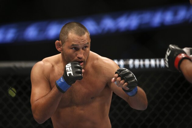 Lyoto Machida Dan Henderson during their UFC 157 light heavyweight mixed martial arts match in Anaheim, Calif., Saturday, Feb. 23, 2013. Machida won by split decision after the third round. (AP Photo/Jae C. Hong)