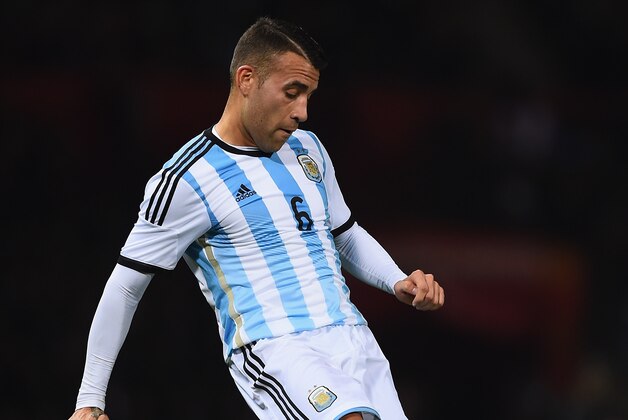 MANCHESTER, ENGLAND - NOVEMBER 18: Nicolas Otamendi of Argentina in action during the International Friendly match between Argentina and Portugal at Old Trafford on November 18, 2014 in Manchester, England.  (Photo by Laurence Griffiths/Getty Images)