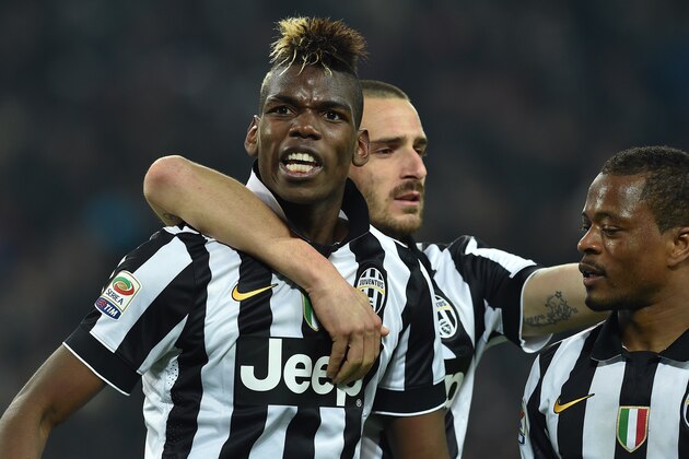 TURIN, ITALY - MARCH 09:  Paul Pogba (L) of Juventus FC celebrates after scoring the opening goal during the Serie A match between Juventus FC and US Sassuolo Calcio at Juventus Arena on March 9, 2015 in Turin, Italy.  (Photo by Valerio Pennicino/Getty Images)