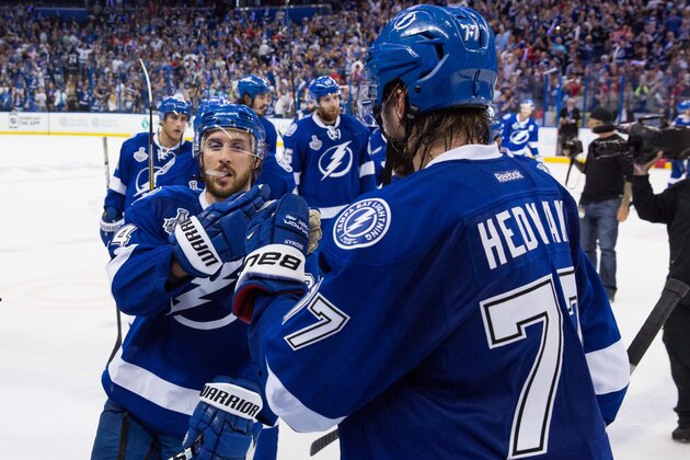 TAMPA, FL - JUNE 6: Victor Hedman #77 and Ryan Callahan #24 of the Tampa Bay Lightning celebrate the win against the Chicago Blackhawks after Game Two of the 2015 NHL Stanley Cup Final at Amalie Arena on June 6, 2015 in Tampa, Florida.  (Photo by Scott Audette/NHLI via Getty Images)