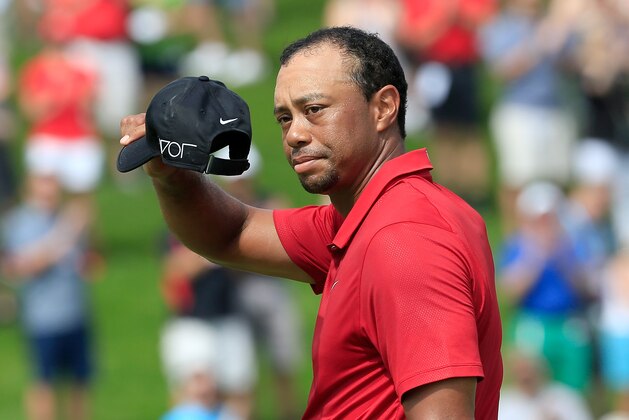 DUBLIN, OH - JUNE 07:  Tiger Woods of the United States acknowledges the crowd on the 18th hole during the final round of The Memorial Tournament presented by Nationwide at Muirfield Village Golf Club on June 7, 2015 in Dublin, Ohio.  (Photo by Sam Greenwood/Getty Images)