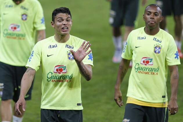 Brazil's Thiago Silva, left, and Robinho, attend a training session in Sao Paulo, Brazil, Saturday, June 6, 2015. Brazil will face Mexico on Sunday in a friendly soccer match in preparation for the Copa America in Chile which begins Thursday. (AP Photo/Andre Penner)