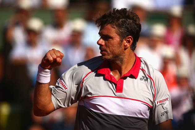 PARIS, FRANCE - JUNE 07:  Stanislas Wawrinka of Switzerland celebrates a point in the Men's Singles Final against Novak Djokovic of Serbia on day fifteen of the 2015 French Open at Roland Garros on June 7, 2015 in Paris, France.  (Photo by Dan Istitene/Getty Images)