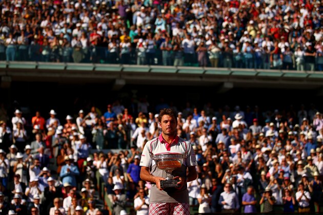 PARIS, FRANCE - JUNE 07:  Stanislas Wawrinka of Switzerland poses with the Coupe de Mousquetaires after victory in the Men's Singles Final against Novak Djokovic of Serbia on day fifteen of the 2015 French Open at Roland Garros on June 7, 2015 in Paris, France.  (Photo by Dan Istitene/Getty Images)