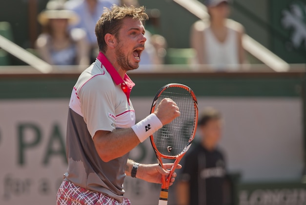 Jun 5, 2015; Paris, France; Stanislas Wawrinka (SUI) reacts during his match against Jo-Wilfried Tsonga (FRA) on day 13 of the 2015 French Open at Roland Garros.  Mandatory Credit: Susan Mullane-USA TODAY Sports