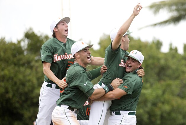 Miami Hurricanes celebrate after the super regionals game against VCU of the NCAA college baseball tournament, Saturday, June 6, 2015, in Coral Gables, Fla. Miami won 10-3. (AP Photo/J Pat Carter)