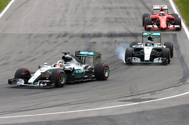 MONTREAL, QC - JUNE 07:  Lewis Hamilton of Great Britain and Mercedes GP leads Nico Rosberg of Germany and Mercedes GP and Kimi Raikkonen of Finland and Ferrari during the Canadian Formula One Grand Prix at Circuit Gilles Villeneuve on June 7, 2015 in Montreal, Canada.  (Photo by Clive Mason/Getty Images)