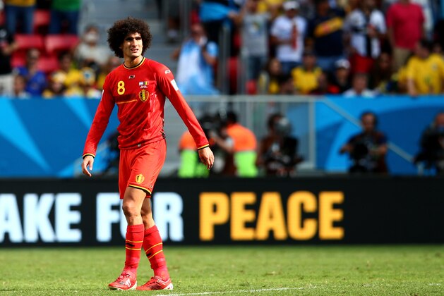 BRASILIA, BRAZIL - JULY 05: Marouane Fellaini of Belgium reacts after being defeated by Argentina 1-0 during the 2014 FIFA World Cup Brazil Quarter Final match between Argentina and Belgium at Estadio Nacional on July 5, 2014 in Brasilia, Brazil.  (Photo by Julian Finney/Getty Images)