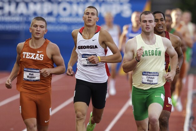 Texas' Wolf Mahler, left, Georgia's Maicel Uibo, center, and Oregon's Dakotah Keys run during the decathlon 1,500 meters at the NCAA outdoor track and field championships Thursday, June 12, 2014, in Eugene, Ore. Uibo won the decathlon. Mahler came in first place in the 1,500 meters, while Keys finished in second place and Uibo in third. (AP Photo/Rick Bowmer)