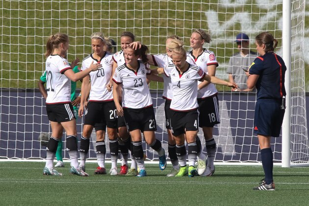 OTTAWA, ON - JUNE 7: Sara Dabritz #23 of Germany celebrates her goal with teammates including Tabea Kemme #22, Lena Goessling #20, Leonie Maier #4 and Alexandra Popp #18 during the FIFA Women's World Cup Canada 2015 Group B match between Germany and Cote d'Ivoire at Lansdowne Stadium on June 7, 2015 in Ottawa, Canada.  (Photo by Andre Ringuette/Getty Images)