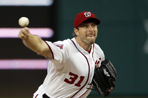Washington Nationals starting pitcher Max Scherzer  throws during the third inning of the second baseball game of a doubleheader against the Toronto Blue Jays at Nationals Park, Tuesday, June 2, 2015, in Washington. (AP Photo/Alex Brandon)
