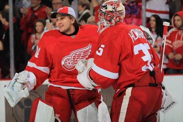 DETROIT, MI - FEBRUARY 10:  Jimmy Howard #35 of the Detroit Red Wings celebrates the win with back-up goaltender Petr Mrazek #34 after a NHL game against the Los Angeles Kings at Joe Louis Arena on February 10, 2013 in Detroit, Michigan. Detroit defeated Los Angeles 3-2  (Photo by Dave Reginek/NHLI via Getty Images)