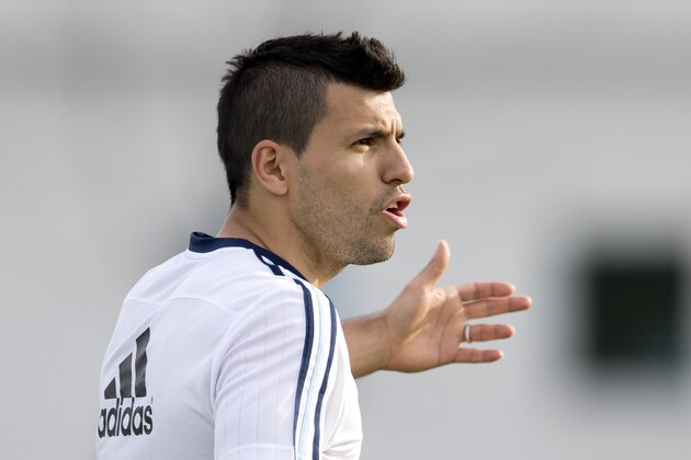 Argentina's Sergio Aguero talks to teammates during a training session in Buenos Aires, Argentina, Monday, June 1, 2015. The Argentina national national team members are training for the Copa America which starts in June in neighboring Chile. (AP Photo/Natacha Pisarenko)