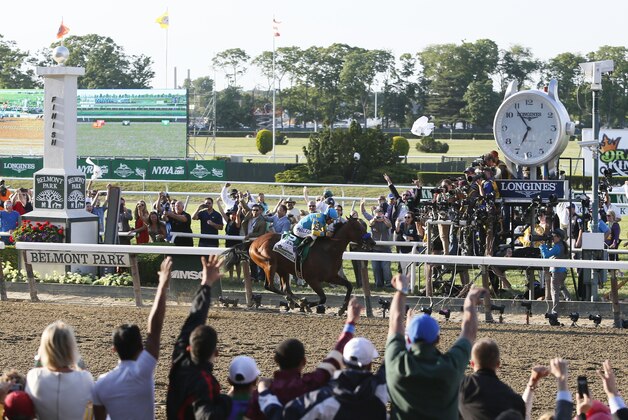 IMAGE DISTRIBUTED FOR LONGINES - Victor Espinoza rides American Pharaoh to a stunning victory by five and half lengths at the 147th Belmont Stakes at Belmont Park Race Track, to secure the first Triple Crown win in 37 years, Saturday, June 6, 2015 in Elmont, N.Y. (Photo by Stuart Ramson/Invision for Longines/AP Images) IMAGE DISTRIBUTED FOR LONGINES - Victor Espinoza rides American Pharaoh to a stunning victory by five and half lengths at the 147th Belmont Stakes at Belmont Park Race Track, to secure the first Triple Crown win in 37 years, Saturday, June 6, 2015 in Elmont, N.Y. (Photo by Stuart Ramson/Invision for Longines/AP Images)