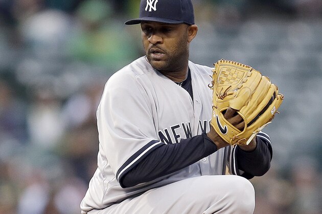 New York Yankees' CC Sabathia pitches against the Oakland Athletics during the first inning of a baseball game Thursday, May 28, 2015, in Oakland, Calif. (AP Photo/Ben Margot)