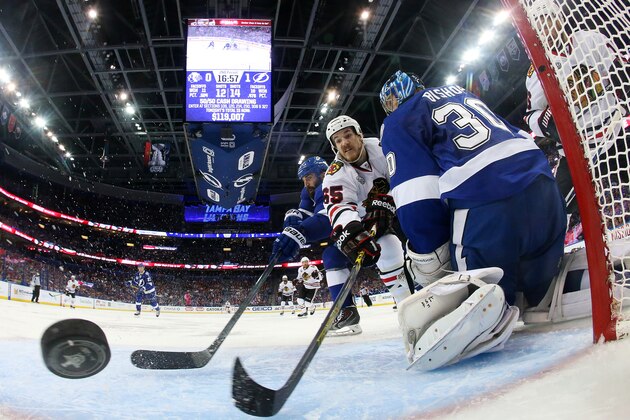 Chicago Blackhawks center Andrew Shaw (65) scores past Tampa Bay Lightning goalie Ben Bishop during the second period in Game 2 of the NHL hockey Stanley Cup Final on Saturday, June 6, 2015, in Tampa Fla. (Bruce Bennett/Pool Photo via AP)