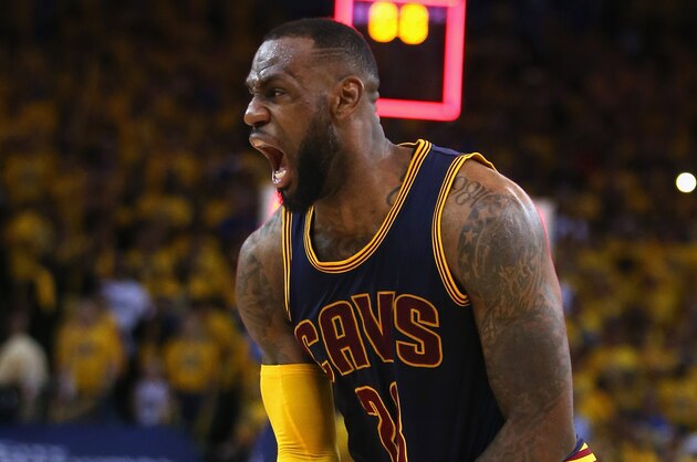 OAKLAND, CA - JUNE 07:  LeBron James #23 of the Cleveland Cavaliers celebrates their 95 to 93 win over the Golden State Warriors in overtime during Game Two of the 2015 NBA Finals at ORACLE Arena on June 7, 2015 in Oakland, California. NOTE TO USER: User expressly acknowledges and agrees that, by downloading and or using this photograph, user is consenting to the terms and conditions of Getty Images License Agreement.  (Photo by Ezra Shaw/Getty Images)