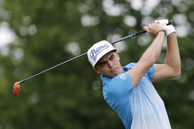 Rickie Fowler tees off on the third hole during the first round of the Memorial golf tournament, Thursday, June 4, 2015, in Dublin, Ohio. (AP Photo/Darron Cummings)