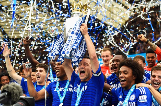 LONDON, ENGLAND - MAY 24:  John Terry of Chelsea celebrates with the trophy after the Barclays Premier League match between Chelsea and Sunderland at Stamford Bridge on May 24, 2015 in London, England. Chelsea were crowned Premier League champions.  (Photo by Mike Hewitt/Getty Images)
