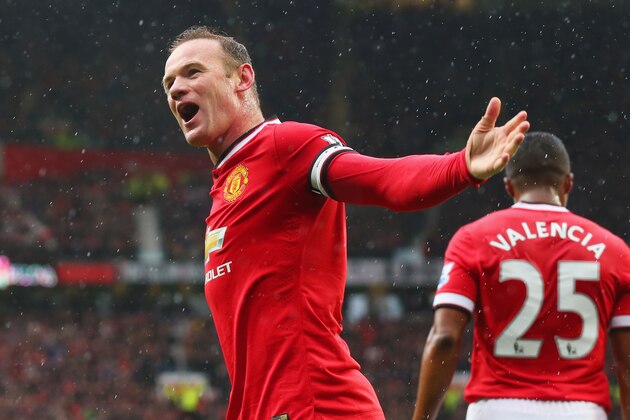 MANCHESTER, ENGLAND - APRIL 12:  Wayne Rooney of Manchester United celebrates as Marouane Fellaini scores their second goal with a header during the Barclays Premier League match between Manchester United and Manchester City at Old Trafford on April 12, 2015 in Manchester, England.  (Photo by Alex Livesey/Getty Images)