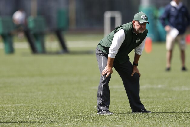 New York Jets offensive coordinator Chan Gailey watches organized team activities at the team's NFL football training center, Wednesday, June 3, 2015, in Florham Park, N.J. (AP Photo/Julio Cortez)