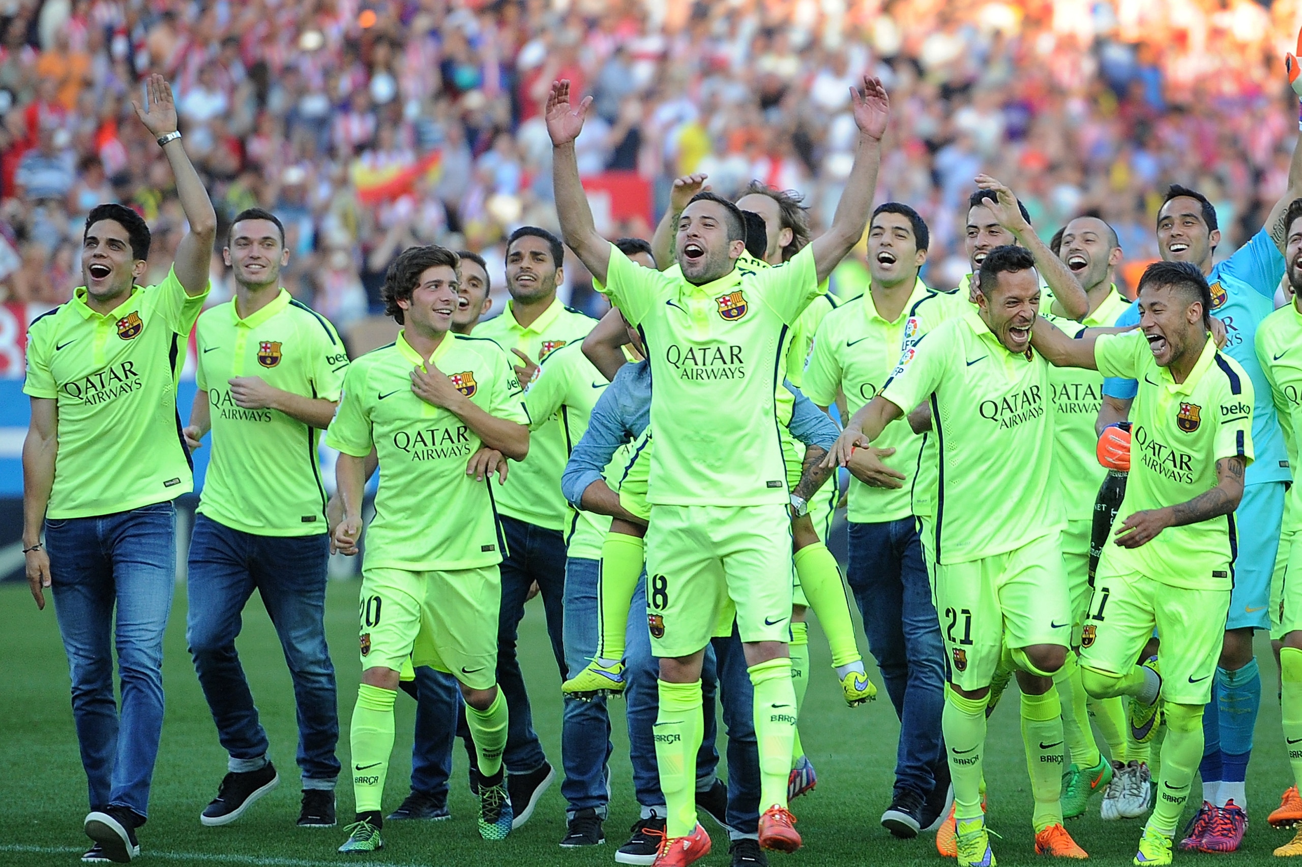 MADRID, SPAIN - MAY 17: FC Barcelona players celebrate after winning the La Liga at the end of the La Liga match between Club Atletico de Madrid and FC Barcelona at Vicente Calderon Stadium on May 17, 2015 in Madrid, Spain. (Photo by Denis Doyle/Getty Images) MADRID, SPAIN - MAY 17: FC Barcelona players celebrate after winning the La Liga at the end of the La Liga match between Club Atletico de Madrid and FC Barcelona at Vicente Calderon Stadium on May 17, 2015 in Madrid, Spain. (Photo by Denis Doyle/Getty Images)
