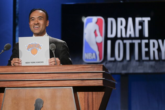 NBA Deputy Commissioner Mark Tatum announces that the New York Knicks have the fourth pick in the draft, during the NBA basketball draft lottery, Tuesday, May 19, 2015, in New York. (AP Photo/Julie Jacobson)