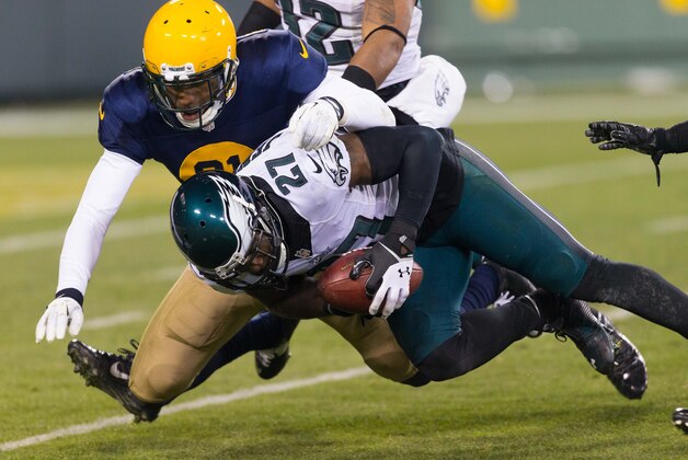 Nov 16, 2014; Green Bay, WI, USA; Philadelphia Eagles safety Malcolm Jenkins (27) recovers the football during the game against the Green Bay Packers at Lambeau Field. Green Bay won 53-20. Mandatory Credit: Jeff Hanisch-USA TODAY Sports Nov 16, 2014; Green Bay, WI, USA; Philadelphia Eagles safety Malcolm Jenkins (27) recovers the football during the game against the Green Bay Packers at Lambeau Field. Green Bay won 53-20. Mandatory Credit: Jeff Hanisch-USA TODAY Sports