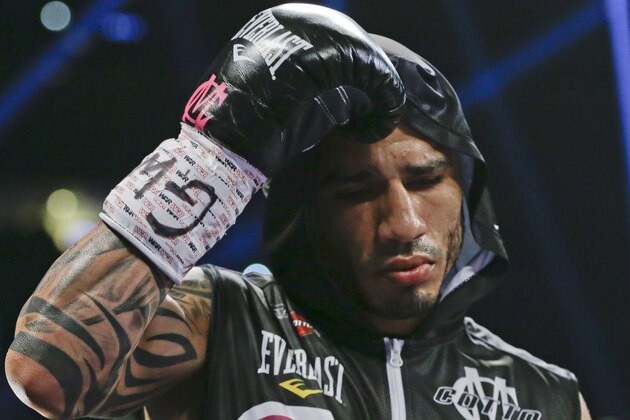 Miguel Cotto, of Puerto Rico, steps into the ring for a WBC World Middleweight Title boxing match against Sergio Martinez, of Argentina, Saturday, June 7, 2014, in New York.  Cotto won by technical knockout during the first ninth round. (AP Photo/Frank Franklin II)