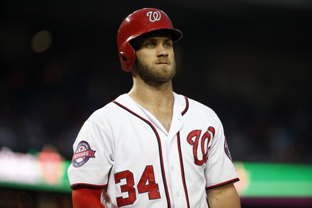 Washington Nationals right fielder Bryce Harper (34) pauses while batting during a baseball game against the Toronto Blue Jays at Nationals Park, Wednesday, June 3, 2015, in Washington. (AP Photo/Alex Brandon)