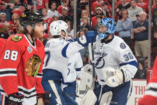 CHICAGO, IL - JUNE 08:  Victor Hedman #77 of the Tampa Bay Lightning skates in to hug goalie Ben Bishop #30 after defeating the Chicago Blackhawks 3-2 during Game Three of the 2015 NHL Stanley Cup Final at the United Center on June 8, 2015 in Chicago, Illinois.  (Photo by Bill Smith/NHLI via Getty Images)
