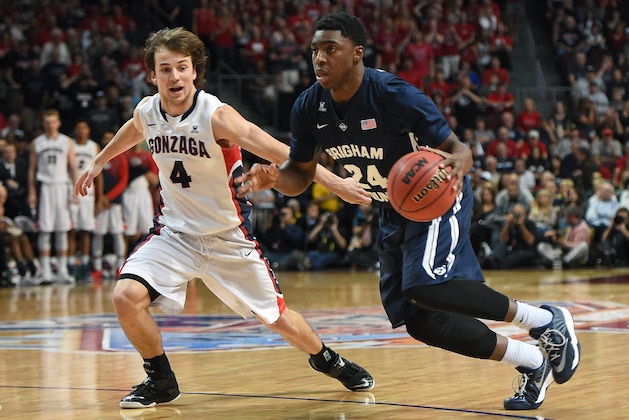 LAS VEGAS, NV - MARCH 10:  Frank Bartley IV #24 of the Brigham Young Cougars drives against Kevin Pangos #4 of the Gonzaga Bulldogs during the championship game of the West Coast Conference Basketball tournament at the Orleans Arena on March 10, 2015 in Las Vegas, Nevada. Gonzaga won 91-75.  (Photo by Ethan Miller/Getty Images)