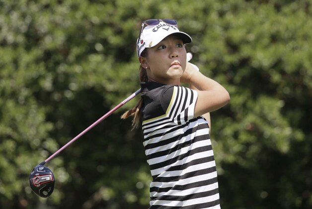 Lydia Ko watches her tee shot on the second hole during the third round of the LPGA North Texas Shootout golf tournament, Saturday, May 2, 2015, in Irving, Texas. (AP Photo/LM Otero)