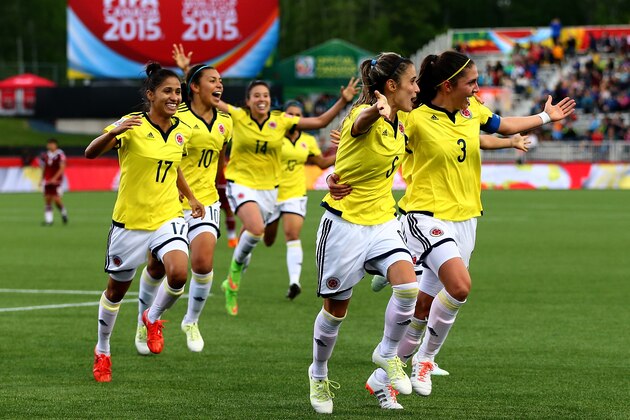 MONCTON, NB - JUNE 09:  Daniela Montoya #6 of Colombia celebrates her goal with teammates in the second half against Mexico during the FIFA Women's World Cup 2015 Group F match at Moncton Stadium on June 9, 2015 in Moncton, Canada.  (Photo by Elsa/Getty Images)