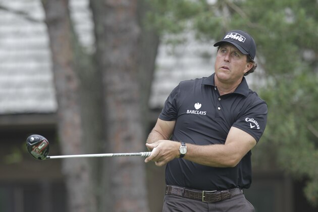 Phil Mickelson plays in the Memorial golf tournament Saturday, June 6, 2015, in Dublin, Ohio. (AP Photo/Jay LaPrete)