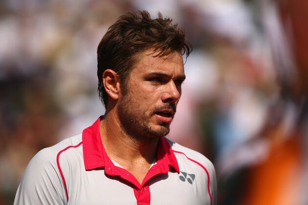 PARIS, FRANCE - JUNE 07:  Stanislas Wawrinka of Switzerland looks on in the Men's Singles Final against Novak Djokovic of Serbia on day fifteen of the 2015 French Open at Roland Garros on June 7, 2015 in Paris, France.  (Photo by Dan Istitene/Getty Images)
