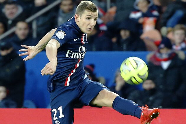 PSG's Lucas Digne  control the ball  during his French League one soccer match between Toulouse FC at the Parc des Princes stadium, in Paris, France, Saturday, Feb. 21, 2015. (AP Photo/Jacques Brinon)