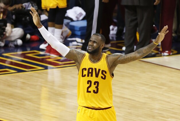 Cleveland Cavaliers forward LeBron James (23) urges on the crowd during the second half of Game 3 of basketball's NBA Finals against the Golden State Warriors in Cleveland, Tuesday, June 9, 2015. (AP Photo/Paul Sancya) Cleveland Cavaliers forward LeBron James (23) urges on the crowd during the second half of Game 3 of basketball's NBA Finals against the Golden State Warriors in Cleveland, Tuesday, June 9, 2015. (AP Photo/Paul Sancya)