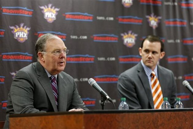 Phoenix Suns President of Basketball Operations Lon Babby, left, introduces newly-appointed Suns general manager Ryan McDonough during a news conference, Thursday, May 9, 2013, in Phoenix. McDonough joins the Suns after most recently serving the past three seasons as the assistant general manager of the Boston Celtics. (AP Photo/Matt York)
