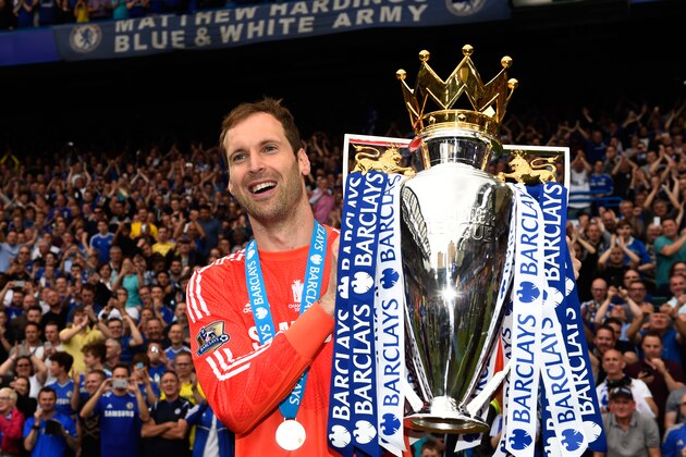 LONDON, ENGLAND - MAY 24:  Petr Cech of Chelsea celebrates with the trophy after the Barclays Premier League match between Chelsea and Sunderland at Stamford Bridge on May 24, 2015 in London, England. Chelsea were crowned Premier League champions.  (Photo by Mike Hewitt/Getty Images)