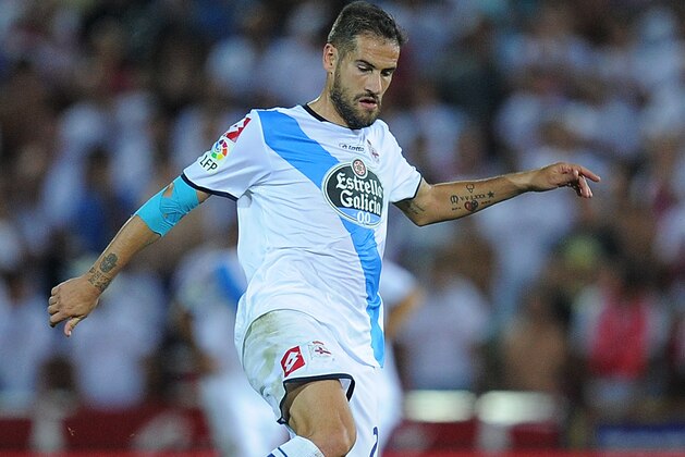 GRANADA, SPAIN - AUGUST 23:  Alberto Lopo of RC Deportivo La Coruna in action during the La liga match between Granada CF and RC Deportivo La Coruna at Estadio Nuevo Los Carmenes on August 23, 2014 in Granada, Spain.  (Photo by Denis Doyle/Getty Images)