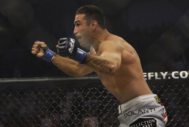 Fabricio Werdum celebrates after beating Fedor Emelianenko in a Strikeforce/M-1 Global mixed martial arts match in San Jose, Calif., Saturday, June 26, 2010. Werdum won by submission in the first round. (AP Photo/Jeff Chiu)