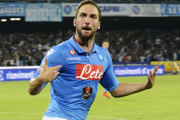 Napoli's Gonzalo Higuaín celebrates after scoring during a Serie A soccer match between Napoli and Lazio, at the San Paolo stadium in Naples, Italy, Sunday, May 31, 2015 . (AP Photo/Salvatore Laporta)